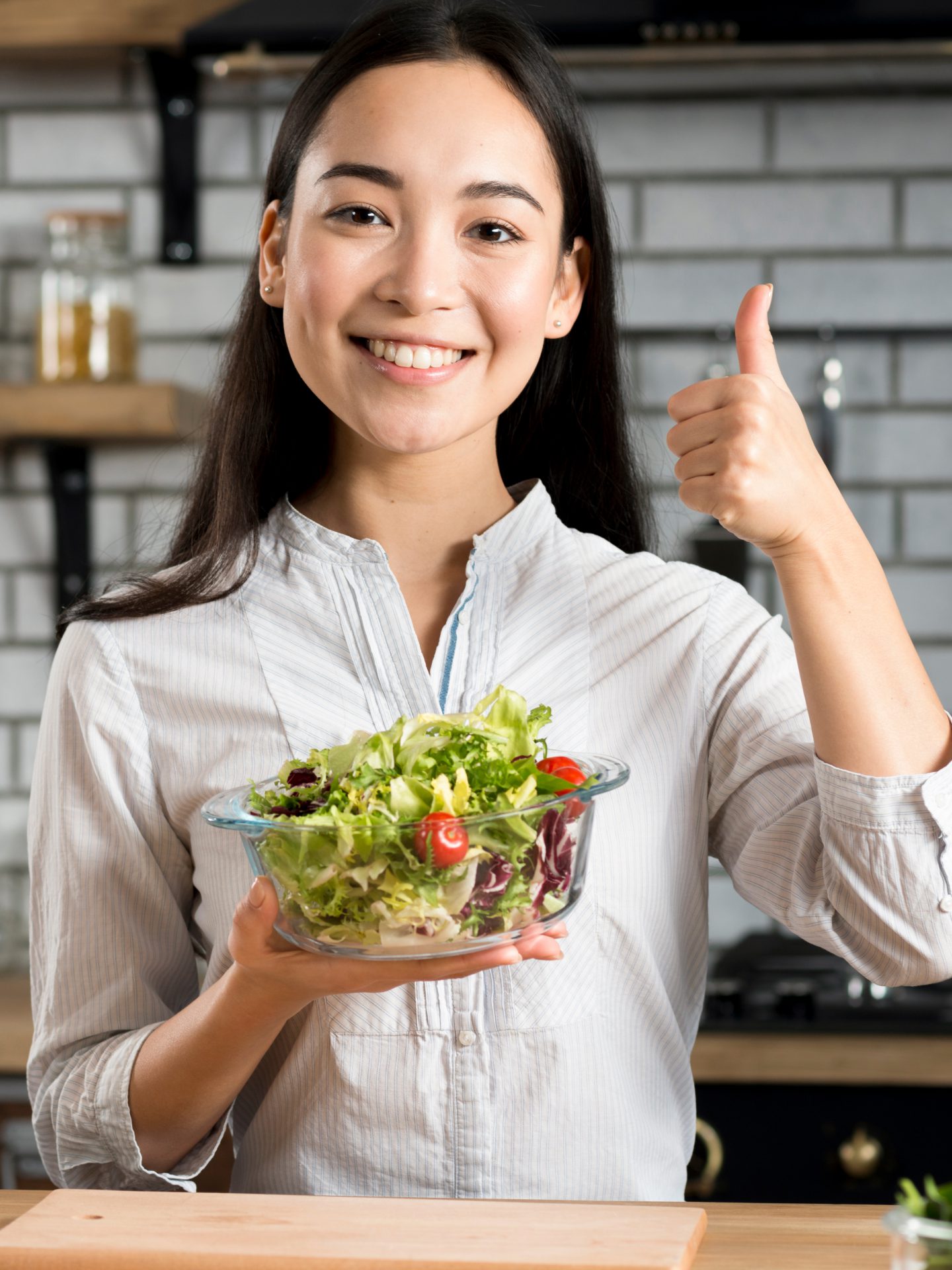 Asian Woman Showing Thumb Up Sign With Holding Healthy Vegetables Salad Kitchen